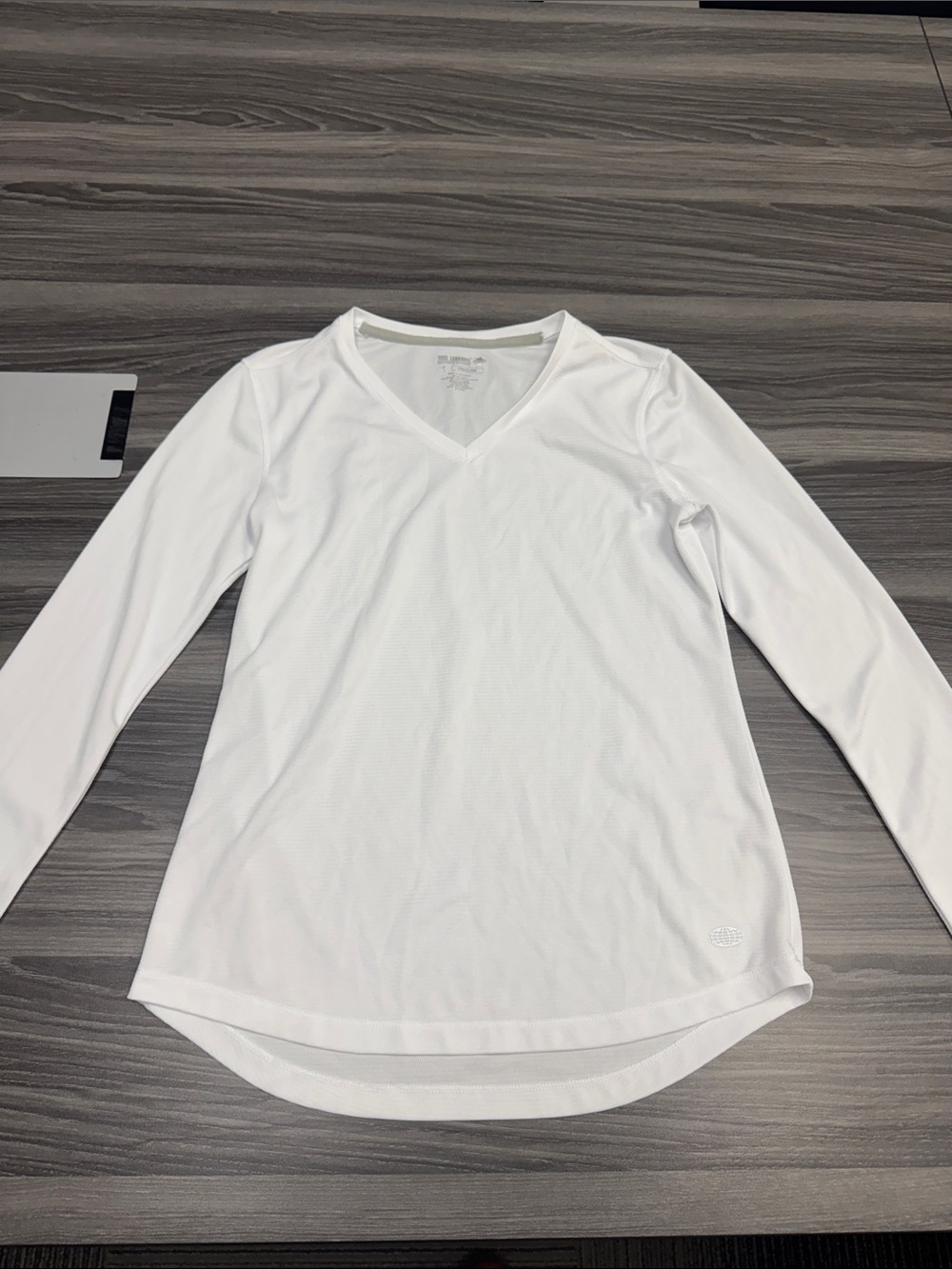 Reel Legends Women's White V‑Neck Long Sleeve Performance Top